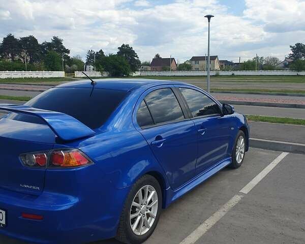 Синій Міцубісі Lancer, об'ємом двигуна 2 л та пробігом 153 тис. км за 8500 $, фото 7 на Automoto.ua