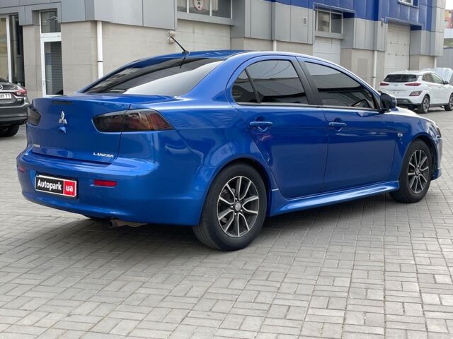 Синій Міцубісі Lancer, об'ємом двигуна 2 л та пробігом 180 тис. км за 9290 $, фото 4 на Automoto.ua