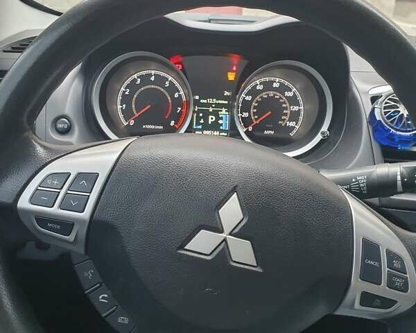 Синій Міцубісі Lancer, об'ємом двигуна 2 л та пробігом 153 тис. км за 8500 $, фото 3 на Automoto.ua