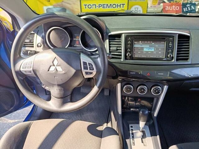 Синий Мицубиси Лансер, объемом двигателя 2 л и пробегом 115 тыс. км за 8700 $, фото 12 на Automoto.ua