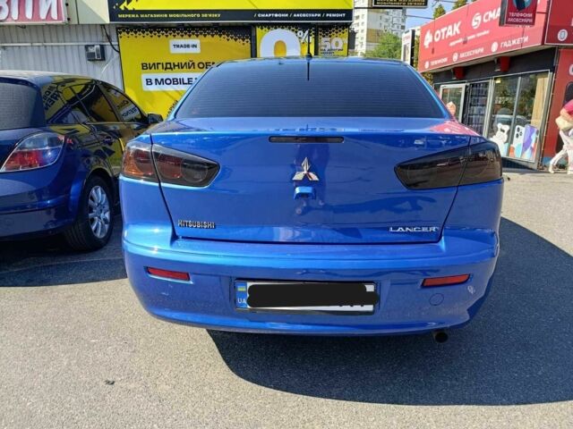 Синий Мицубиси Лансер, объемом двигателя 2 л и пробегом 130 тыс. км за 7800 $, фото 3 на Automoto.ua