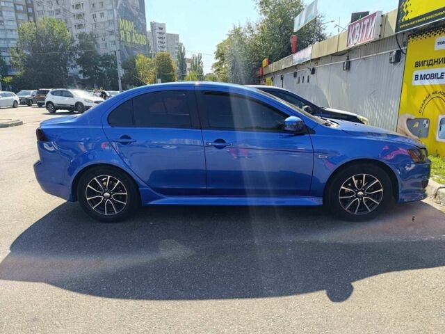 Синий Мицубиси Лансер, объемом двигателя 2 л и пробегом 130 тыс. км за 7800 $, фото 4 на Automoto.ua