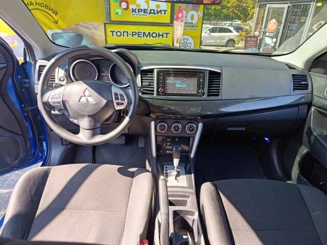 Синий Мицубиси Лансер, объемом двигателя 2 л и пробегом 130 тыс. км за 7800 $, фото 9 на Automoto.ua