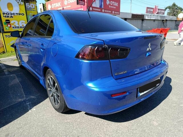 Синий Мицубиси Лансер, объемом двигателя 2 л и пробегом 130 тыс. км за 7800 $, фото 2 на Automoto.ua