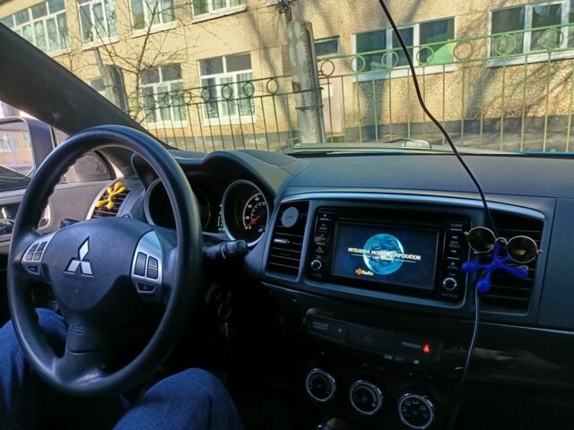 Синий Мицубиси Лансер, объемом двигателя 2.4 л и пробегом 130 тыс. км за 11700 $, фото 7 на Automoto.ua