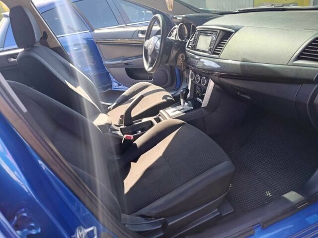 Синий Мицубиси Лансер, объемом двигателя 2 л и пробегом 130 тыс. км за 7800 $, фото 10 на Automoto.ua