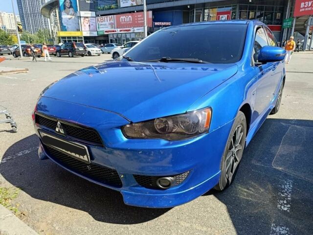 Синий Мицубиси Лансер, объемом двигателя 2 л и пробегом 130 тыс. км за 7800 $, фото 5 на Automoto.ua
