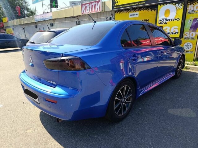 Синий Мицубиси Лансер, объемом двигателя 2 л и пробегом 130 тыс. км за 7800 $, фото 1 на Automoto.ua