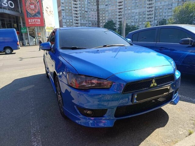 Синий Мицубиси Лансер, объемом двигателя 2 л и пробегом 130 тыс. км за 7800 $, фото 7 на Automoto.ua