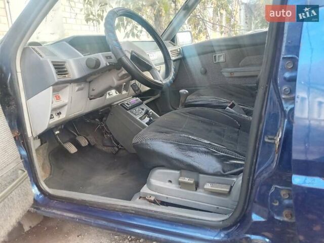 Синий Мицубиси Лансер, объемом двигателя 0 л и пробегом 330 тыс. км за 450 $, фото 2 на Automoto.ua