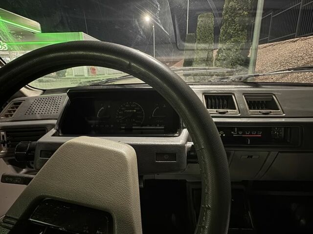 Синий Мицубиси Лансер, объемом двигателя 1.5 л и пробегом 170 тыс. км за 650 $, фото 6 на Automoto.ua