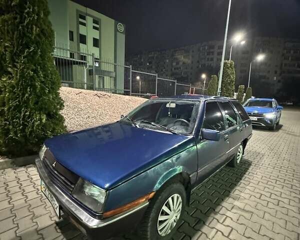 Синий Мицубиси Лансер, объемом двигателя 1.5 л и пробегом 170 тыс. км за 650 $, фото 10 на Automoto.ua