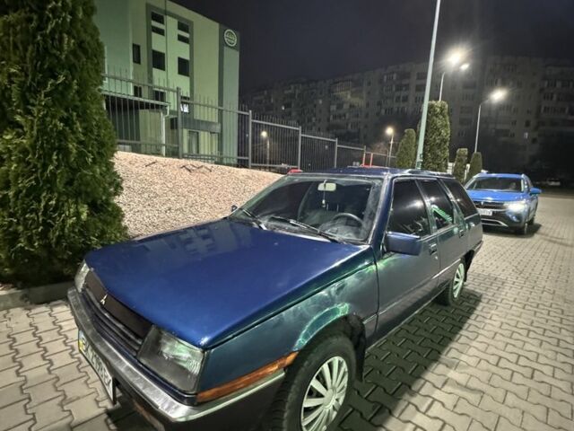 Синий Мицубиси Лансер, объемом двигателя 1.5 л и пробегом 170 тыс. км за 650 $, фото 10 на Automoto.ua