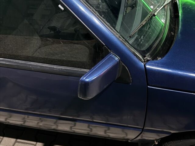 Синий Мицубиси Лансер, объемом двигателя 1.5 л и пробегом 170 тыс. км за 650 $, фото 1 на Automoto.ua