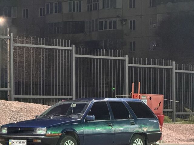 Синий Мицубиси Лансер, объемом двигателя 1.5 л и пробегом 170 тыс. км за 650 $, фото 11 на Automoto.ua