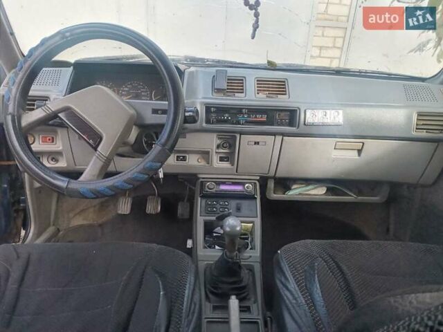Синий Мицубиси Лансер, объемом двигателя 0 л и пробегом 322 тыс. км за 650 $, фото 6 на Automoto.ua