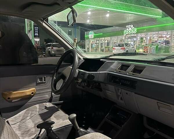 Синий Мицубиси Лансер, объемом двигателя 1.5 л и пробегом 170 тыс. км за 650 $, фото 3 на Automoto.ua