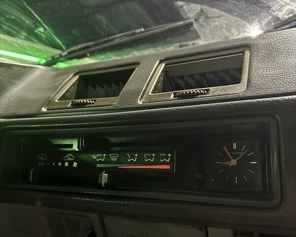 Синий Мицубиси Лансер, объемом двигателя 1.5 л и пробегом 170 тыс. км за 650 $, фото 4 на Automoto.ua