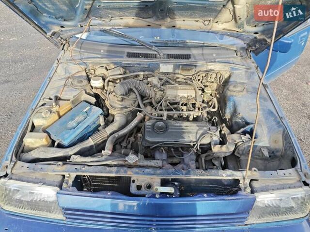 Міцубісі Lancer 1989 у Радехове на Automoto.ua Синій Міцубісі Lancer, об'ємом двигуна 1.5 л та пробігом 300 тис. км за 1000 $, фото 9 на Automoto.ua