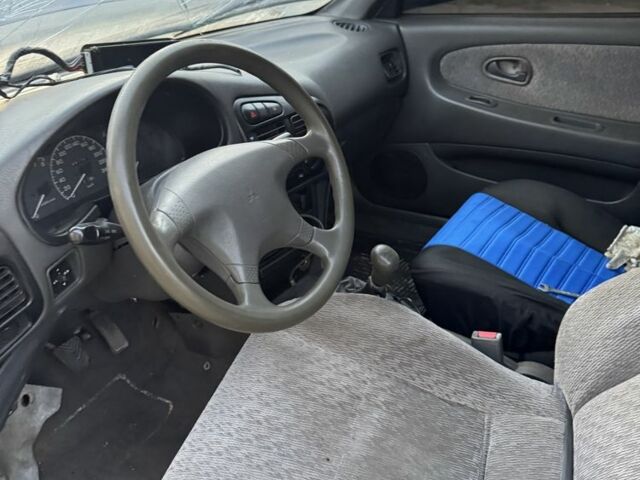 Синий Мицубиси Лансер, объемом двигателя 1.6 л и пробегом 999 тыс. км за 594 $, фото 17 на Automoto.ua