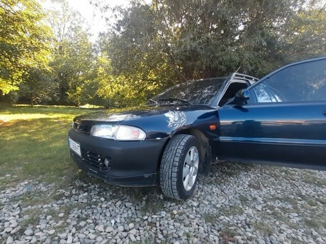Синій Міцубісі Lancer, об'ємом двигуна 1.6 л та пробігом 418 тис. км за 2150 $, фото 1 на Automoto.ua