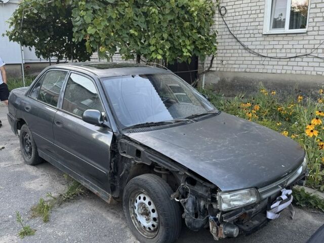 Синий Мицубиси Лансер, объемом двигателя 1.6 л и пробегом 999 тыс. км за 594 $, фото 2 на Automoto.ua