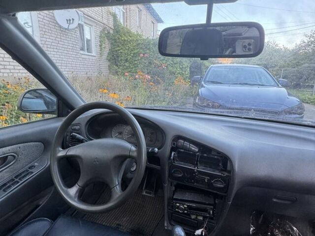 Синий Мицубиси Лансер, объемом двигателя 1.6 л и пробегом 999 тыс. км за 594 $, фото 8 на Automoto.ua