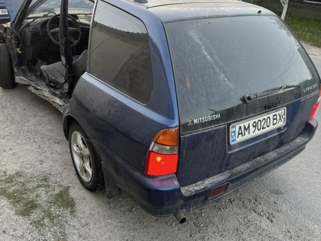 Синий Мицубиси Лансер, объемом двигателя 1.6 л и пробегом 999 тыс. км за 594 $, фото 13 на Automoto.ua