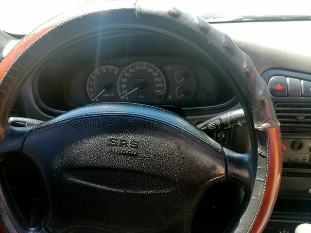 Синий Мицубиси Лансер, объемом двигателя 1.6 л и пробегом 225 тыс. км за 1100 $, фото 5 на Automoto.ua