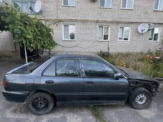 Синий Мицубиси Лансер, объемом двигателя 1.6 л и пробегом 999 тыс. км за 594 $, фото 3 на Automoto.ua