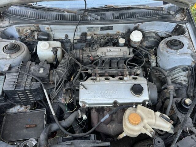 Синий Мицубиси Лансер, объемом двигателя 1.6 л и пробегом 999 тыс. км за 594 $, фото 7 на Automoto.ua