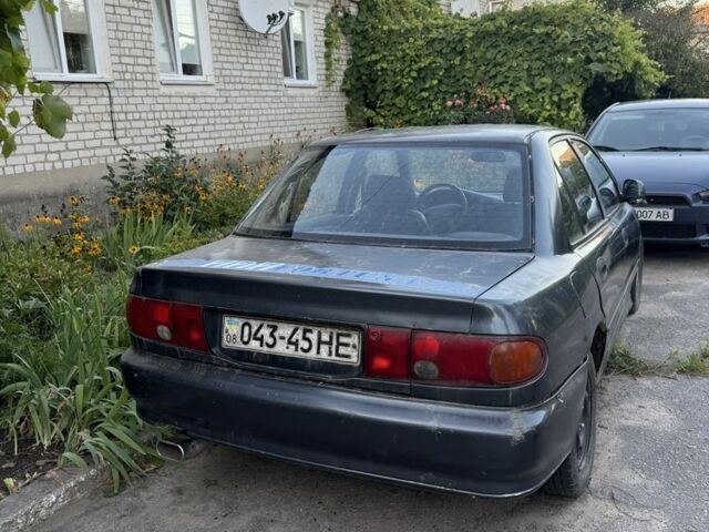 Синий Мицубиси Лансер, объемом двигателя 1.6 л и пробегом 999 тыс. км за 594 $, фото 4 на Automoto.ua