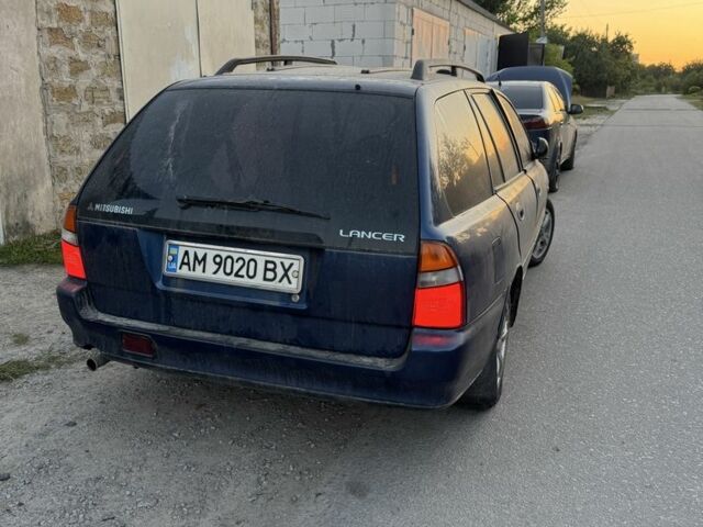 Синий Мицубиси Лансер, объемом двигателя 1.6 л и пробегом 999 тыс. км за 594 $, фото 12 на Automoto.ua