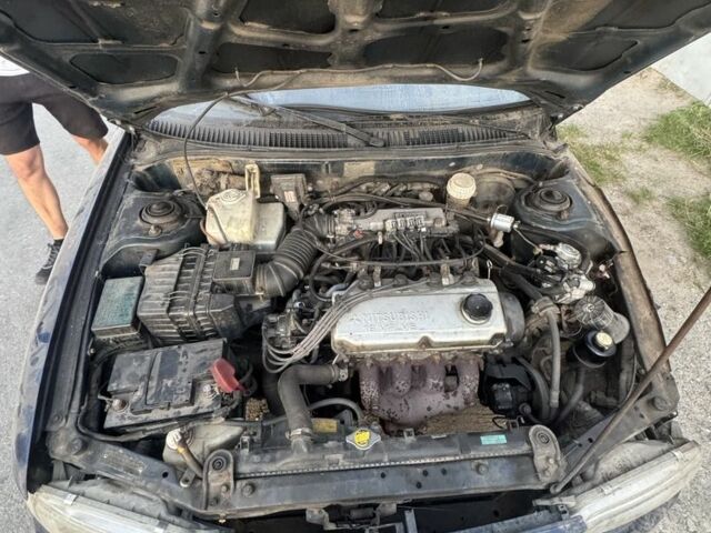 Синий Мицубиси Лансер, объемом двигателя 1.6 л и пробегом 999 тыс. км за 594 $, фото 19 на Automoto.ua