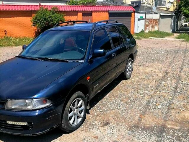 Синий Мицубиси Лансер, объемом двигателя 1.6 л и пробегом 225 тыс. км за 1100 $, фото 2 на Automoto.ua