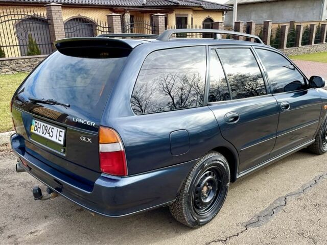 Синій Міцубісі Lancer, об'ємом двигуна 2 л та пробігом 498 тис. км за 3800 $, фото 3 на Automoto.ua