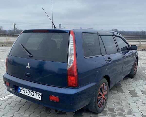 Синій Міцубісі Lancer, об'ємом двигуна 1.58 л та пробігом 330 тис. км за 3350 $, фото 3 на Automoto.ua