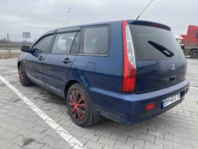 Синий Мицубиси Лансер, объемом двигателя 1.6 л и пробегом 240 тыс. км за 2600 $, фото 3 на Automoto.ua