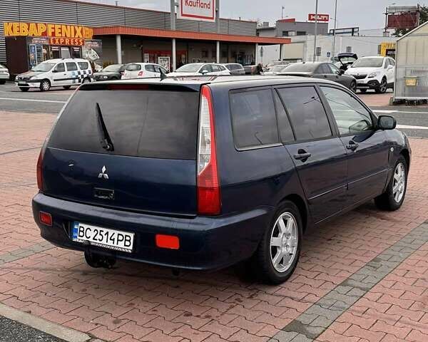 Синій Міцубісі Lancer, об'ємом двигуна 1.58 л та пробігом 220 тис. км за 2699 $, фото 2 на Automoto.ua