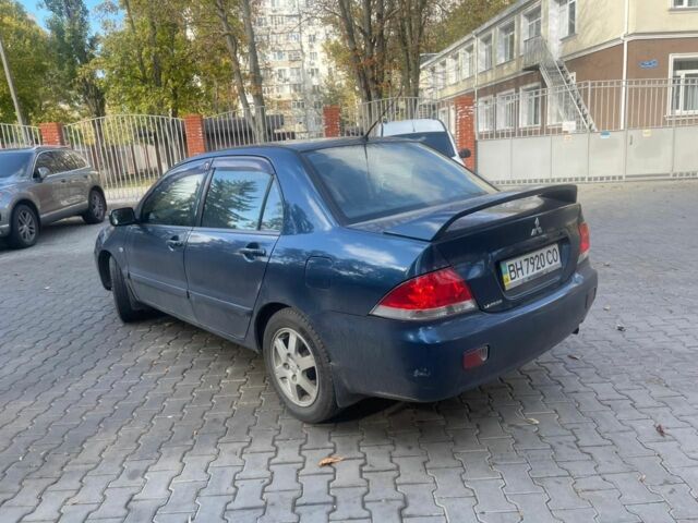Мицубиси Лансер 2005 в Снигиревке на Automoto.ua Синий Мицубиси Лансер, объемом двигателя 2 л и пробегом 237 тыс. км за 3650 $, фото 1 на Automoto.ua