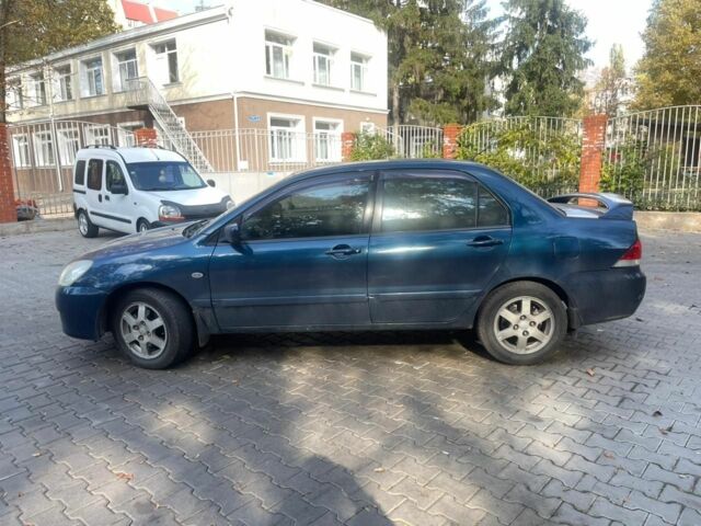 Мицубиси Лансер 2005 в Снигиревке на Automoto.ua Синий Мицубиси Лансер, объемом двигателя 2 л и пробегом 237 тыс. км за 3650 $, фото 2 на Automoto.ua
