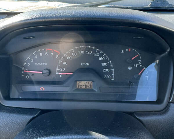 Синий Мицубиси Лансер, объемом двигателя 1.6 л и пробегом 221 тыс. км за 3600 $, фото 8 на Automoto.ua