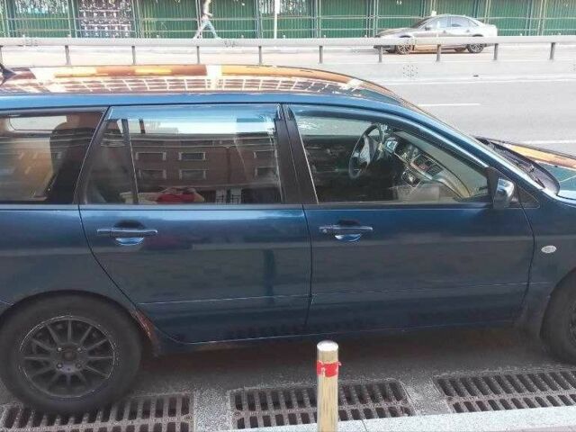 Синій Міцубісі Lancer, об'ємом двигуна 1.6 л та пробігом 245 тис. км за 3299 $, фото 3 на Automoto.ua