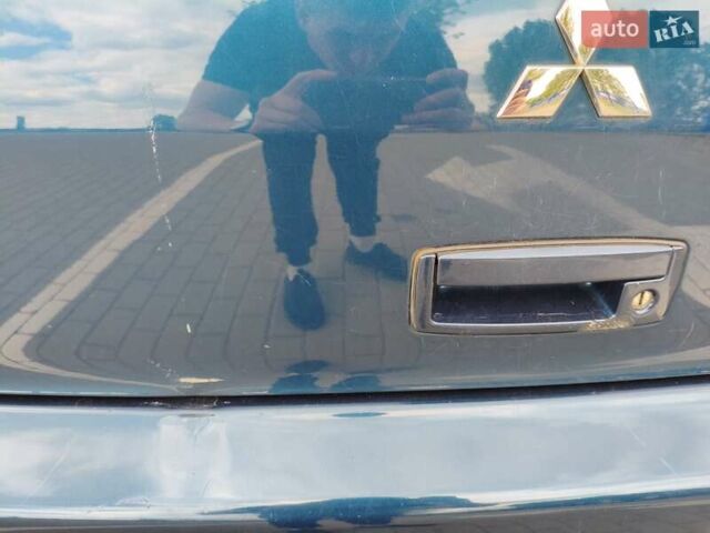 Мицубиси Лансер 2006 в Ковель на Automoto.ua Синий Мицубиси Лансер, объемом двигателя 1.6 л и пробегом 258 тыс. км за 3900 $, фото 15 на Automoto.ua