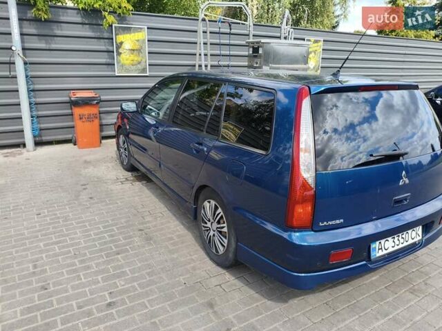 Мицубиси Лансер 2006 в Ковель на Automoto.ua Синий Мицубиси Лансер, объемом двигателя 1.6 л и пробегом 258 тыс. км за 3900 $, фото 4 на Automoto.ua