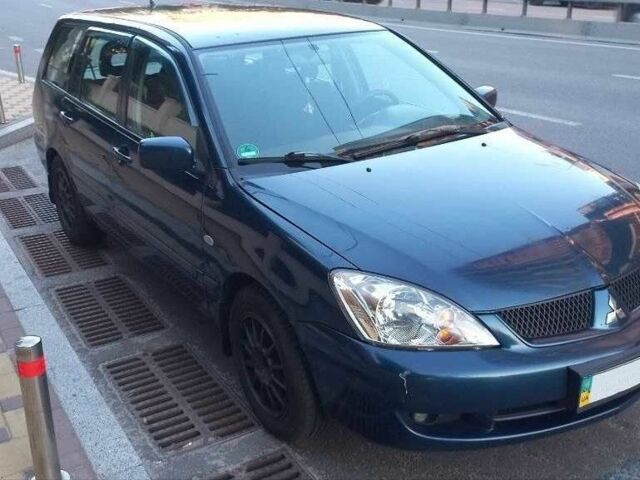Синій Міцубісі Lancer, об'ємом двигуна 1.6 л та пробігом 245 тис. км за 3299 $, фото 2 на Automoto.ua