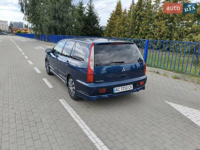 Синій Міцубісі Lancer, об'ємом двигуна 1.6 л та пробігом 258 тис. км за 4300 $, фото 4 на Automoto.ua
