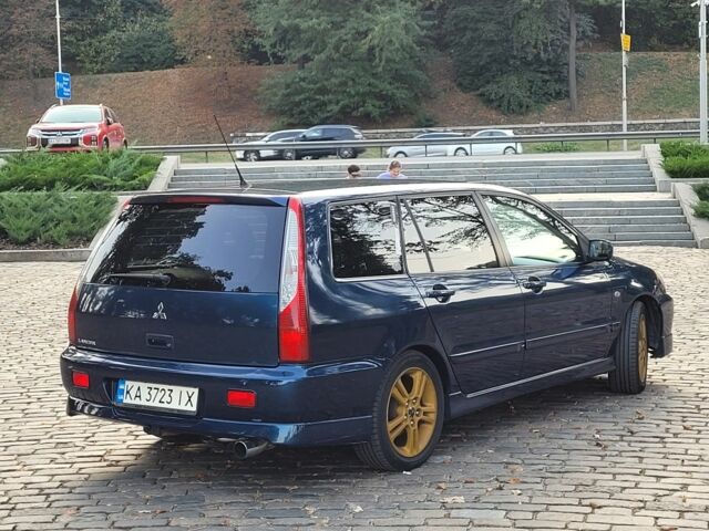 Синій Міцубісі Lancer, об'ємом двигуна 2 л та пробігом 277 тис. км за 5200 $, фото 3 на Automoto.ua