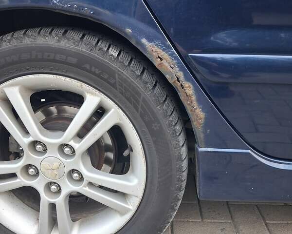 Міцубісі Lancer 2006 у Дніпро (Дніпропетровську) на Automoto.ua Синій Міцубісі Lancer, об'ємом двигуна 1.58 л та пробігом 290 тис. км за 3600 $, фото 4 на Automoto.ua