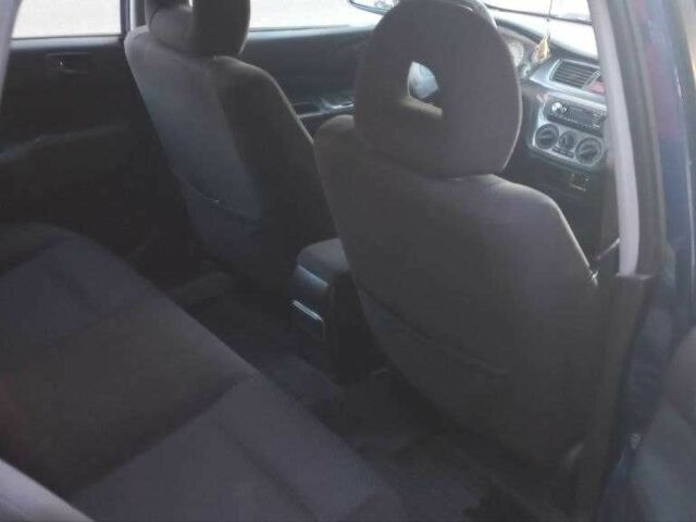 Синій Міцубісі Lancer, об'ємом двигуна 1.6 л та пробігом 245 тис. км за 3299 $, фото 9 на Automoto.ua